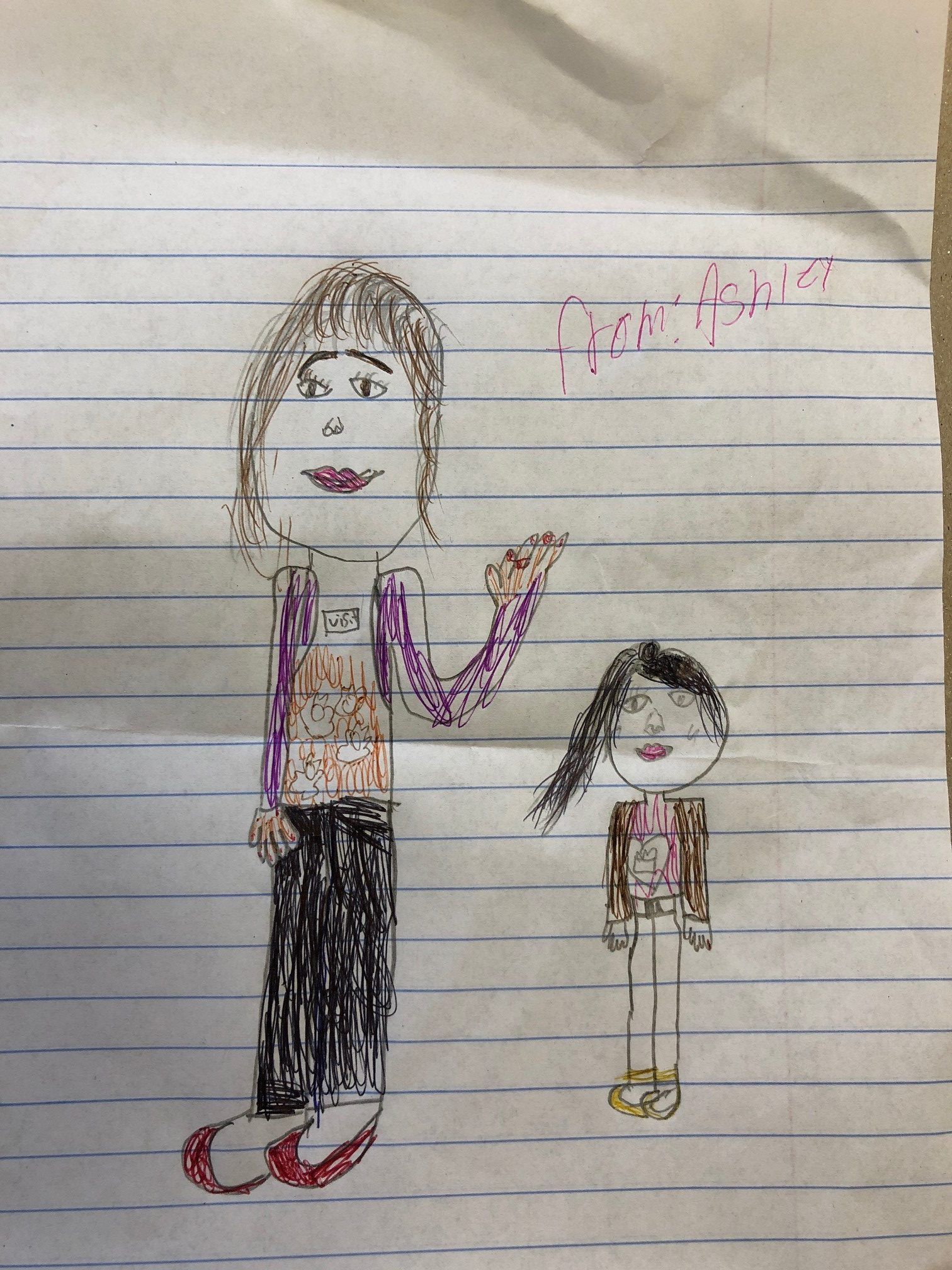 A color drawing on a sheet of notebook paper.
